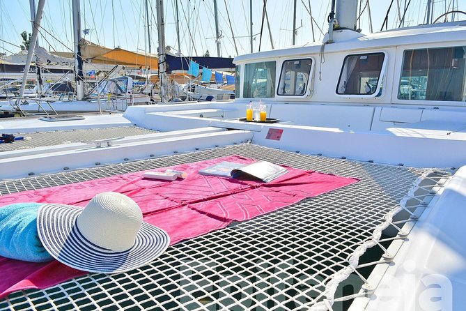 Catamaran cruise in Mykonos with Meal, Drinks & Transport - Wind, Waves, and Flexible Expectations