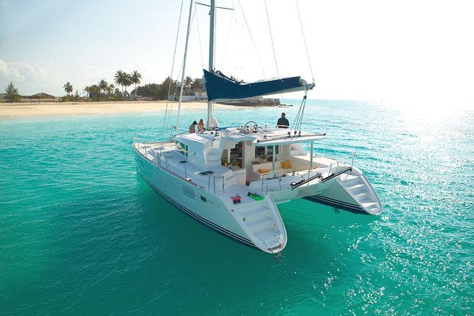 Catamaran cruise in Mykonos with Meal, Drinks & Transport - Sailing Past Baos and Across the Aegean