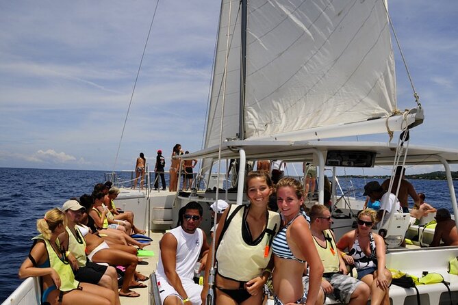 Catamaran Cruise, Open Bar, Food and Snorkeling - Sailing from West Bay Beach into Roatan’s Blue Water