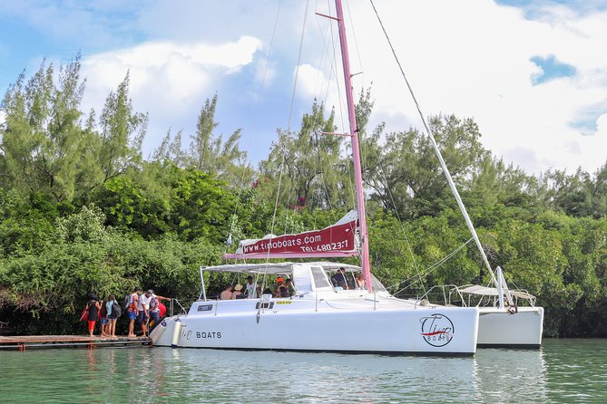 Catamaran cruise to Ile aux cerfs with bbq lunch - First stop: the GRSE waterfalls and coastal scenery