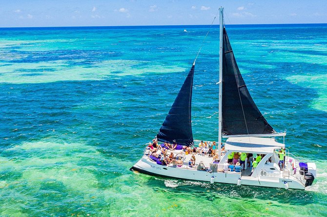 Catamaran Cruise with Snorkeling & Parasailing - The Natural Pool Near Saona Island