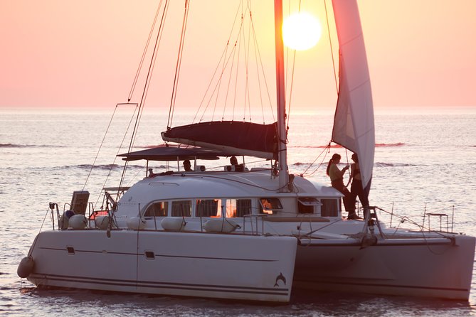 Catamaran Day & Sunset Cruises with meals Drinks and transportation - Rhenia’s clear water and two-hour swim stop