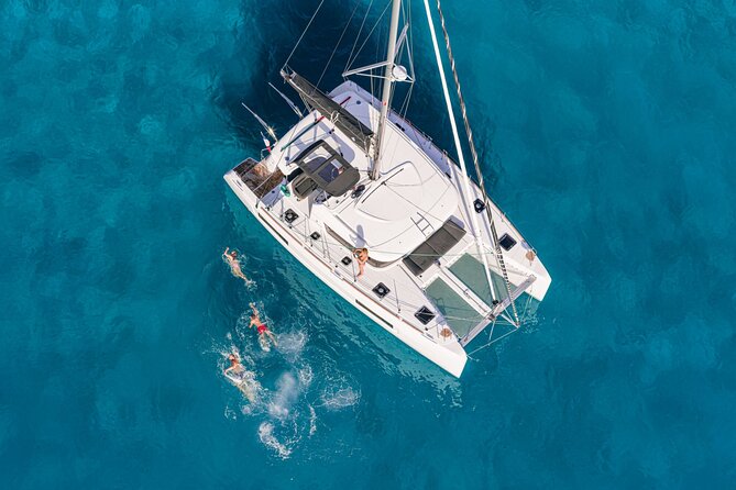 Catamaran Day & Sunset Cruises with meals Drinks and transportation - Choosing between the morning and sunset cruise