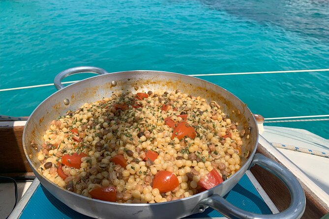 Catamaran Day Trip to La Maddalena Islands with Sardinian Lunch - Lunch with Sardinian flavors on deck