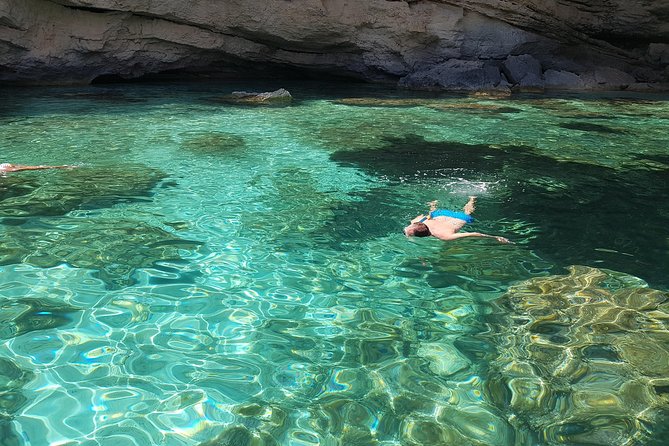 Catamaran Day Trip to the Cale di Orosei with Lunch - Grotta della Contessa offers a cave swim