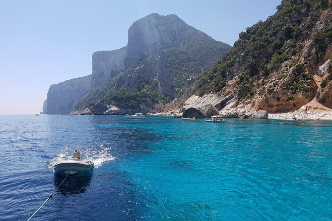 Catamaran Day Trip to the Cale di Orosei with Lunch - Arbatax departure and the first cliff at Pedra Longa