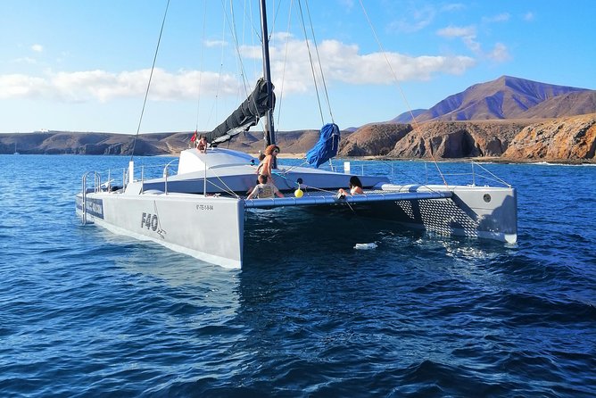 Catamaran F40 Lanzarote sailing - Setting out from Playa Blanca at 11 a.m.