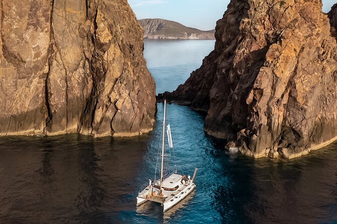 Catamaran Full-Day of Milos and Poliegos With Lunch & BBQ - Kalogries Beach: 40 minutes in remarkably clear water