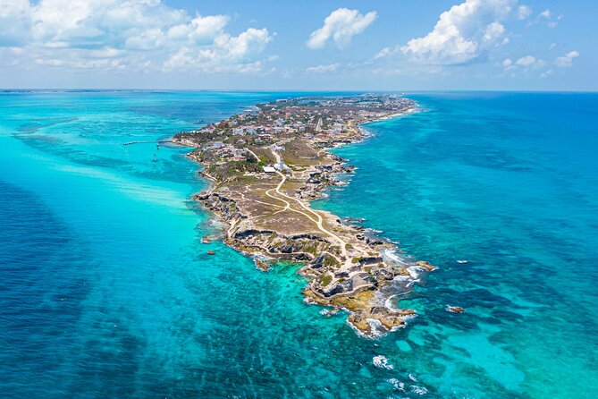 Catamaran Isla Mujeres Tour with Hotel Pick Up included - Snorkeling Among Fish and Coral