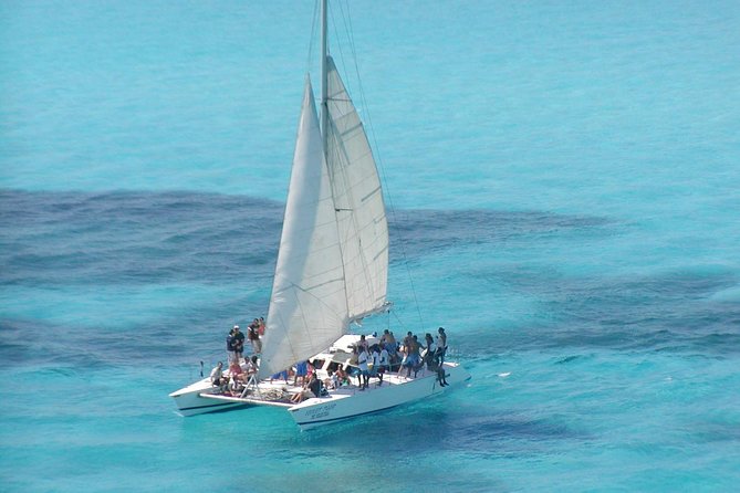 Catamaran Isla Mujeres Tour with Hotel Pick Up included - The Real Timing: Seven Hours on Paper