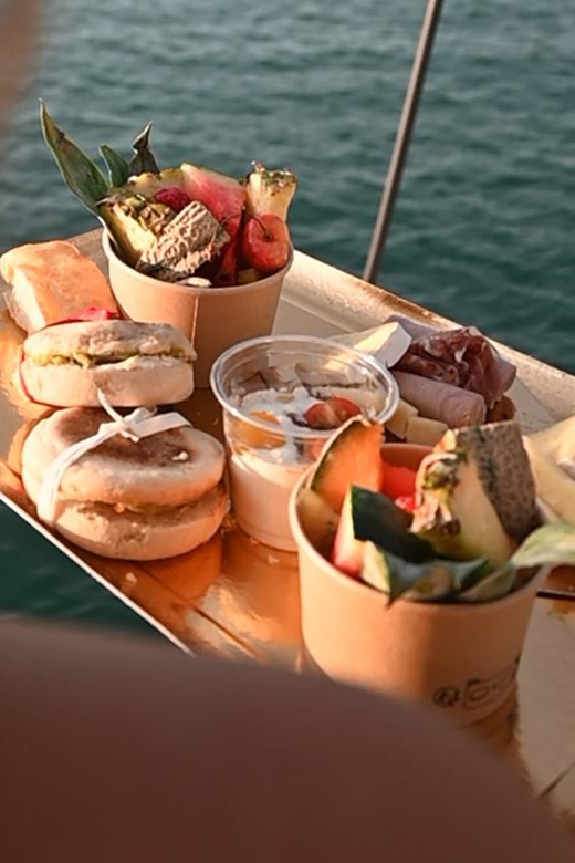 Catamaran Lucile | Sunday brunch - Seeing Grau du Roi and Port-Camargue from offshore
