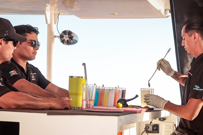 Catamaran - Luxury Private Tour - Passing Divorce Beach and reading the rock formations