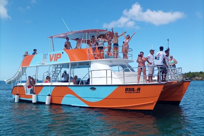 Catamaran Party Cruise with Snorkeling & BBQ - Reaching the boat means walking through the water