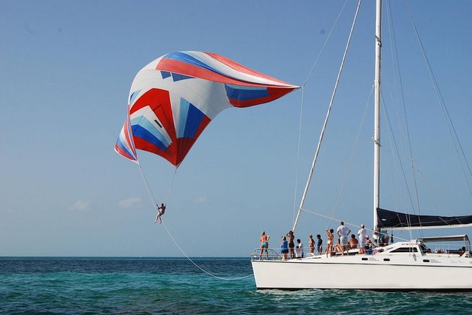 Catamaran Party on the Caribbean Sea to Isla Mujeres - Lunch, beach club time, and Isla Mujeres