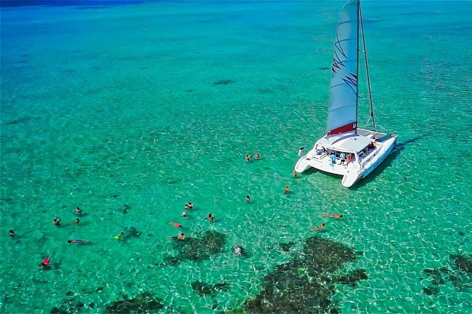 Catamaran to Ile aux Cerf with Parasailing, Tube Riding & Lunch - From your hotel to Trou d’Eau Douce