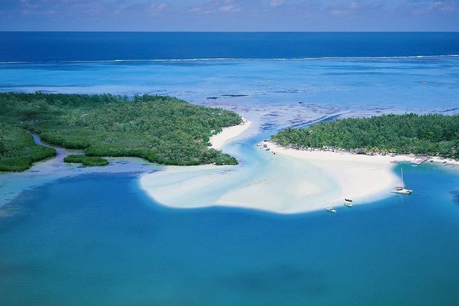 Catamaran to Ile aux Cerf with Parasailing, Tube Riding & Lunch - Tube riding and the more energetic side of the day
