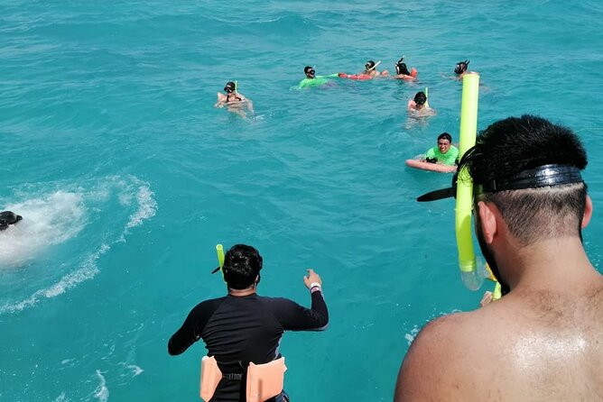 Catamaran to Isla Mujeres at sunset pick up Cancun - Two hours to explore the center of Isla Mujeres