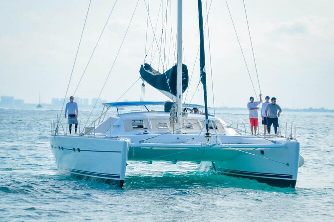 Catamaran to Isla Mujeres – Kids Go Free! (Only Pay Dock Fee) - Free time in downtown Isla Mujeres