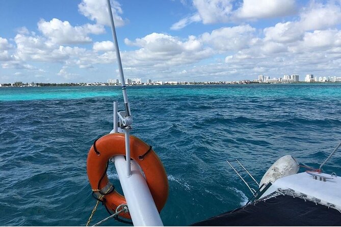 Catamaran to Isla Mujeres, Open bar, buffet, Beach Club Included - Reef snorkeling with a group of up to 45