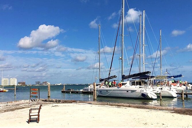 Catamaran to Isla Mujeres, Open bar, buffet, Beach Club Included - Two hours on the island, with room to choose