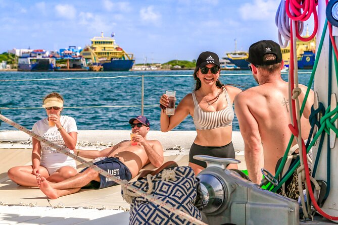 Catamaran to Isla Mujeres Snorkeling Tour with Open Bar and Lunch - Beach-club time and the late buffet