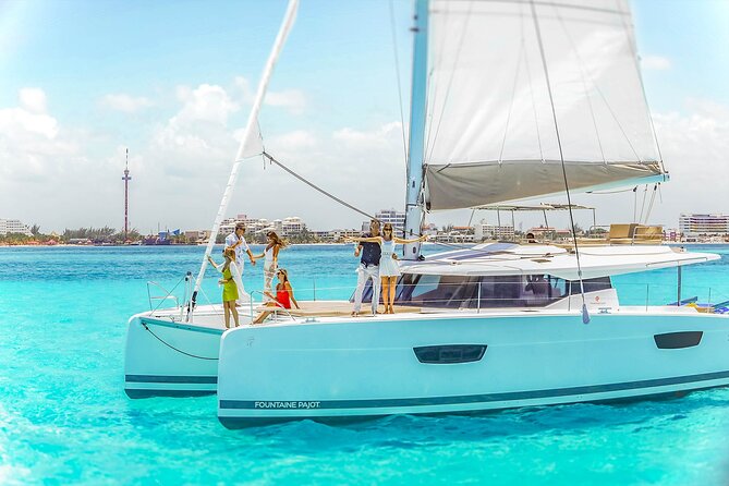Catamaran to Isla Mujeres Snorkeling Tour with Open Bar and Lunch - Isla Mujeres town in a short window