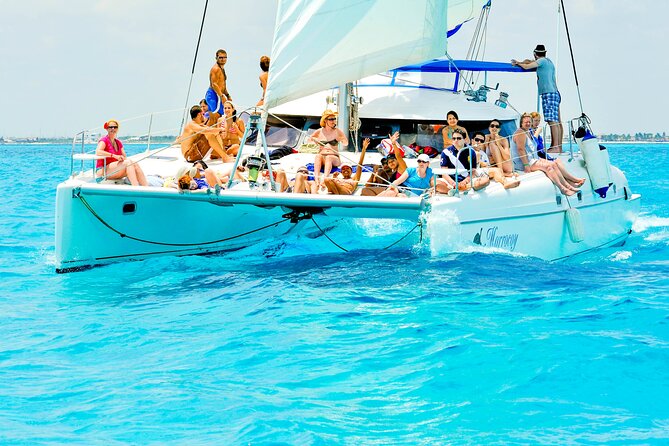 Catamaran to Isla Mujeres Snorkeling Tour with Open Bar and Lunch - The ride back and the sunset question