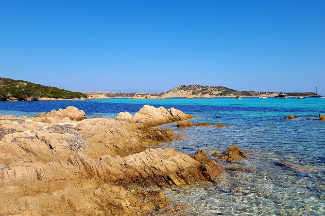 Catamaran Tour from La Caletta near Olbia – Experience Sardinia’s Coast - Santa Lucia, a fishing village seen from the sea
