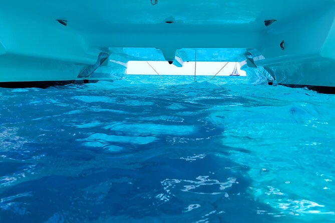 Catamaran Tour from La Caletta near Olbia – Experience Sardinia’s Coast - Capo Comino and its white dunes