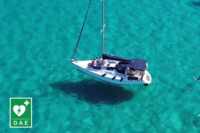 Catamaran tour stops bathing and snorkeling toast with prosecco - Cala Mosca and the White Limestone Coast