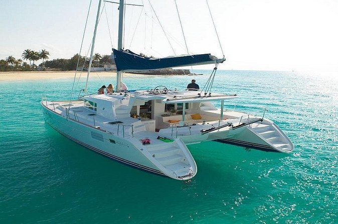 Catamaran Tour to Isla Mujeres from Cancun or Riviera Maya - Snorkeling among Caribbean fish