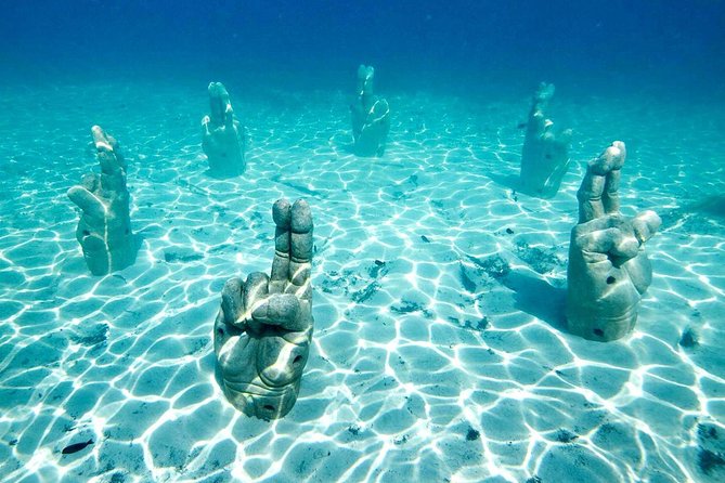Catamaran Tour to Isla Mujeres from Cancun or Riviera Maya - Arriving at Isla Mujeres and using the beach club
