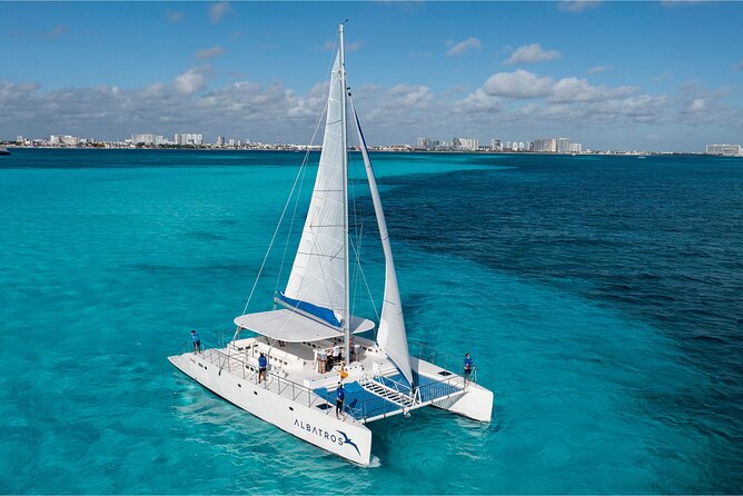 Catamaran Tour to Isla Mujeres Open bar and Lunch - Key Points at a Glance
