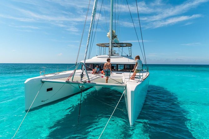 Catamaran Tour to Isla Mujeres, Open bar, Lunch, Snorkeling, Beach Club Included - Leaving Marina Las Perlas