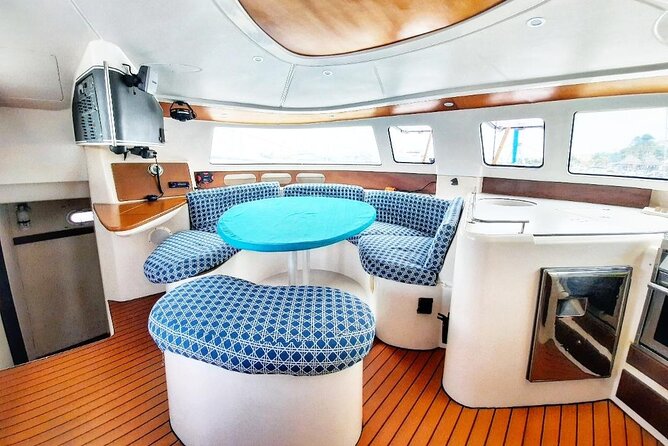 Catamaran Tour to Isla Mujeres Snorkeling with Buffet and Open Bar - What this Isla Mujeres day trip actually offers