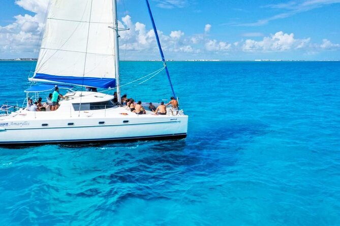 Catamaran Tour to Isla Mujeres Snorkeling with Buffet and Open Bar - The morning pickup from Playa del Carmen
