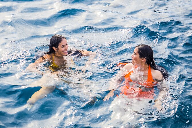 Catamaran tour with swimming stop in Malaga - Crew service and the risk of a booking change