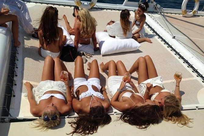 Catamaran trip with other groups along the Costa Brava. Saturday. - Setting sail from Lloret de Mar Beach