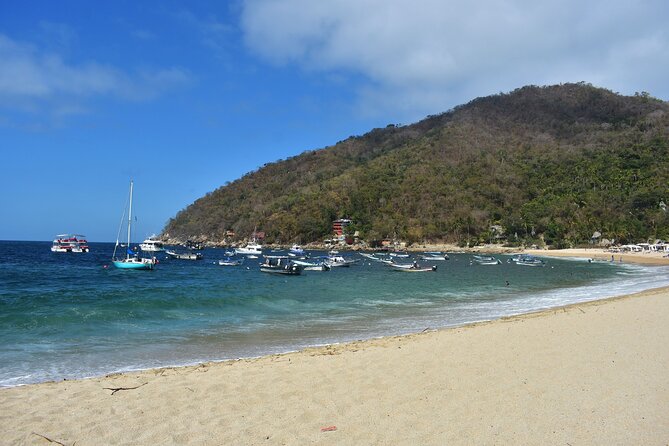 Catamaran Yelapa Beach Tour with Snorkeling, Food and Open Bar - Lunch, beach time, and extra charges