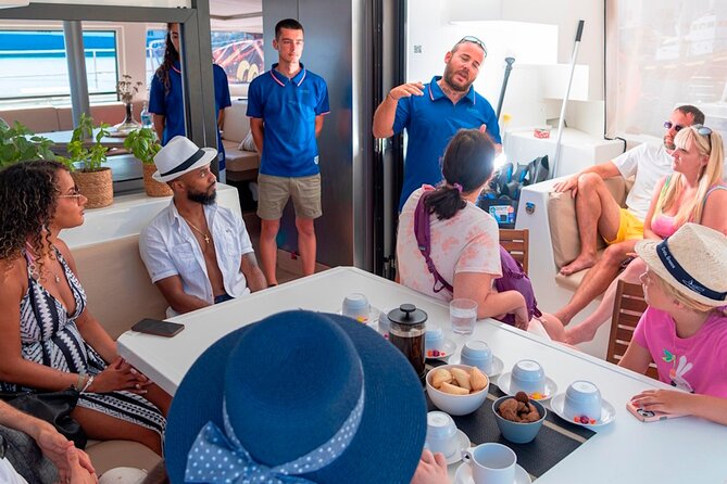 Chania Morning Catamaran Cruise with Premium Lunch & Drinks - Crew service: personal names and practical help