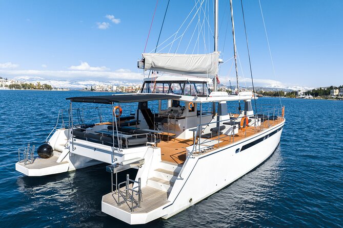 Comfort Max Catamaran Caldera Cruise with BBQ and Drinks - Swimming near Mesa Pigadia and the beach coast