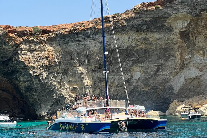 Comino Blue Lagoon Prime Catamaran Tour with All Inclusive - Music, crew style, and the mood onboard