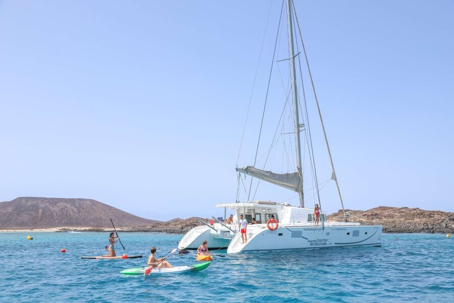 Corralejo: Adults-Only Catamaran Day Trip to Lobos Island - Crossing El Río toward Lobos Island