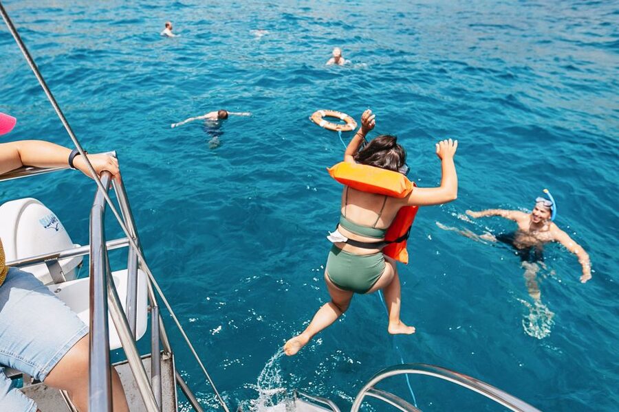 Costa Adeje: Whale Watching Catamaran Tour with Drinks - Fish Farms, Dolphins, and the Chance of a Squid Story