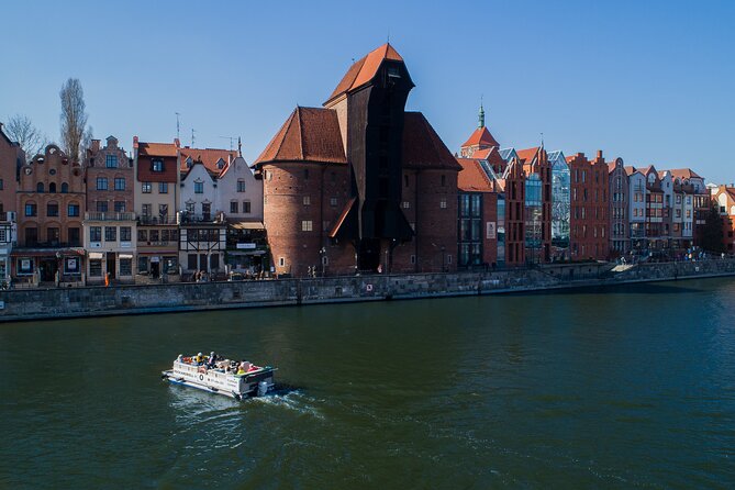 Cruises on the Motlawa River by a luxury catamaran - Gdańsk from the water side - A small catamaran from Green Bridge