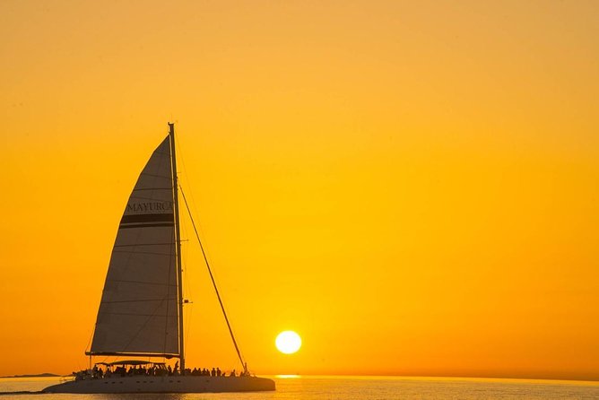 Day Catamaran Trip: Cap des Freus and Llevant Natural Park - Crew style and language