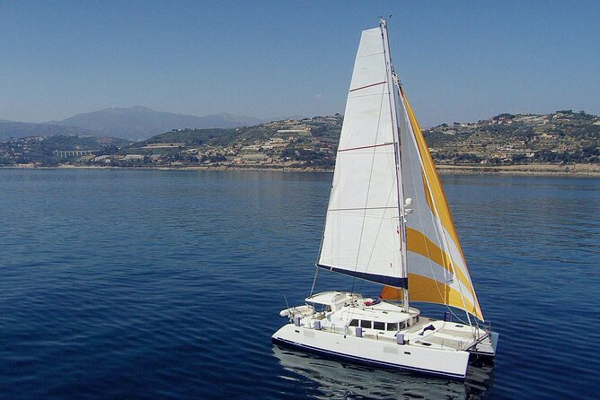 Day trip on a sailing catamaran in Sardinia - Leaving Olbia Through the Working Harbor