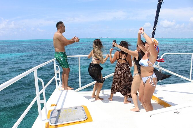 Deluxe Catamaran to Isla Mujeres with Open Bar from Cancun - The beach club buffet and the meaning of deluxe