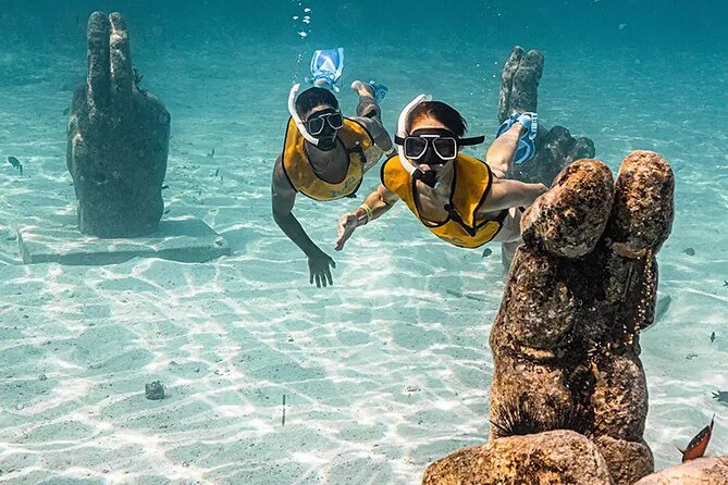 Deluxe Catamaran to Isla Mujeres with Open Bar from Cancun - How the tour compares with a quieter island day