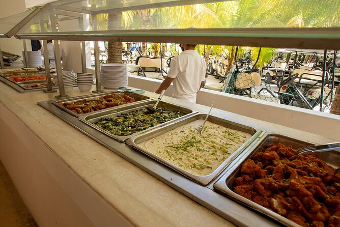 Deluxe Catamaran tour to Isla Mujeres with Open Bar and Lunch - Two and a half hours at Albatros Beach Club